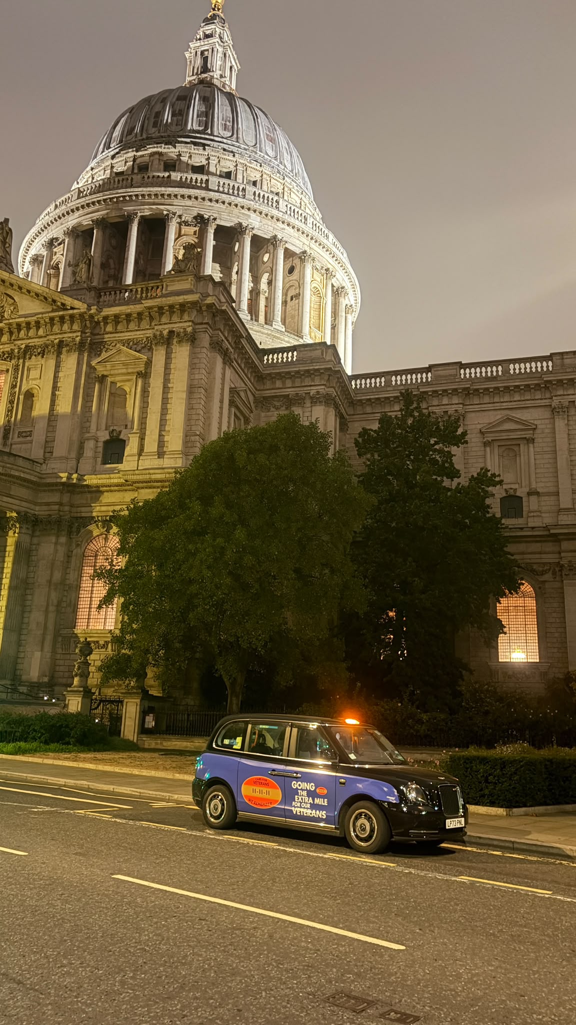 Liveried cab outside St Paul's
