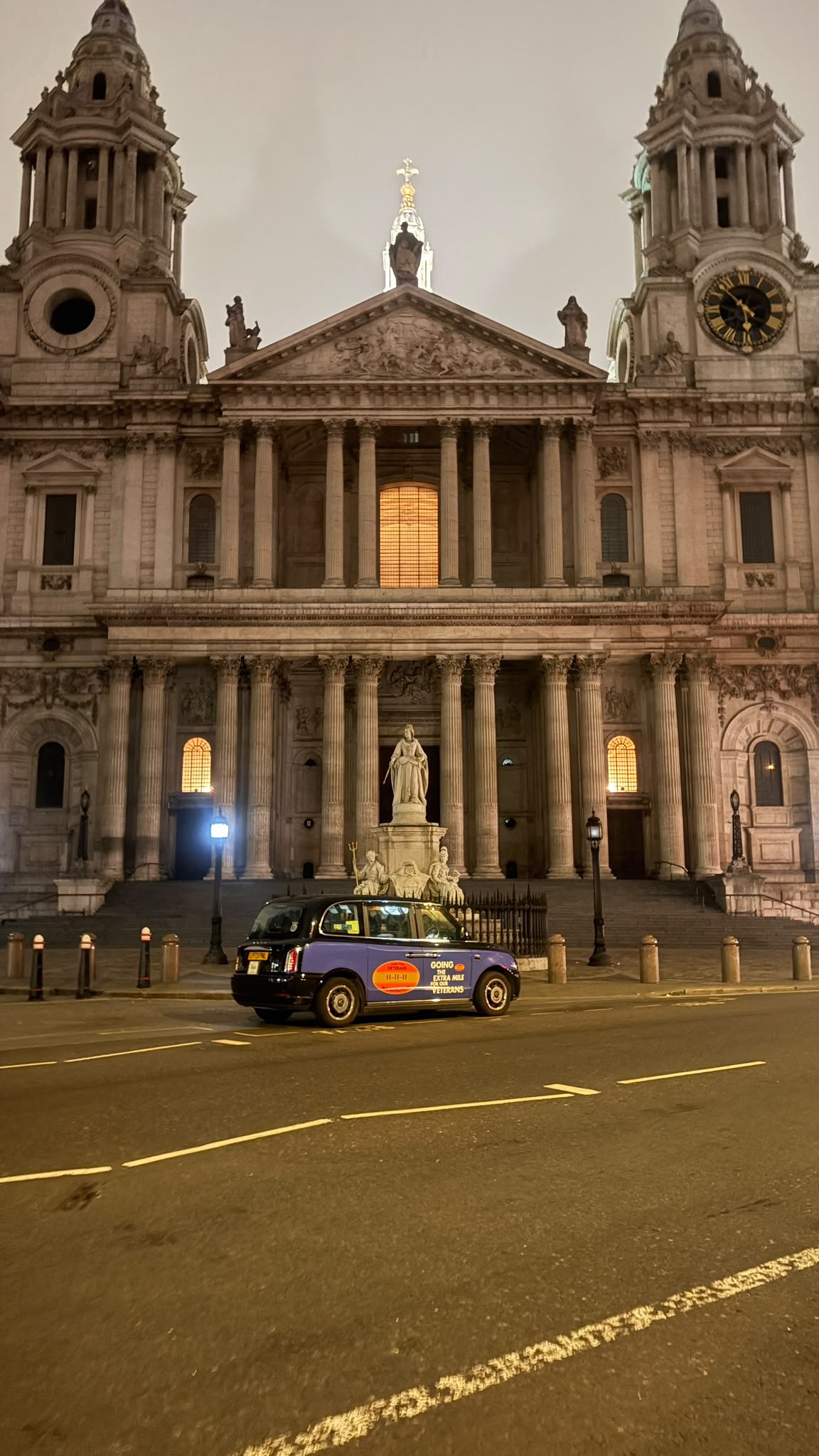 Liveried cab outside St Paul's